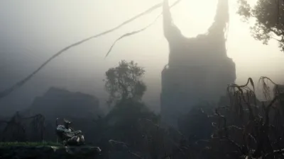 The misty open world of Mortal Shell 2 with a towering structure in the distance